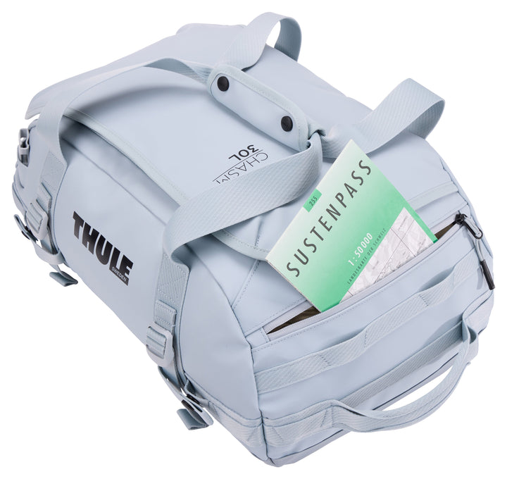 Light gray backpack with a green card labeled 'SUSTENPASS' on a white background